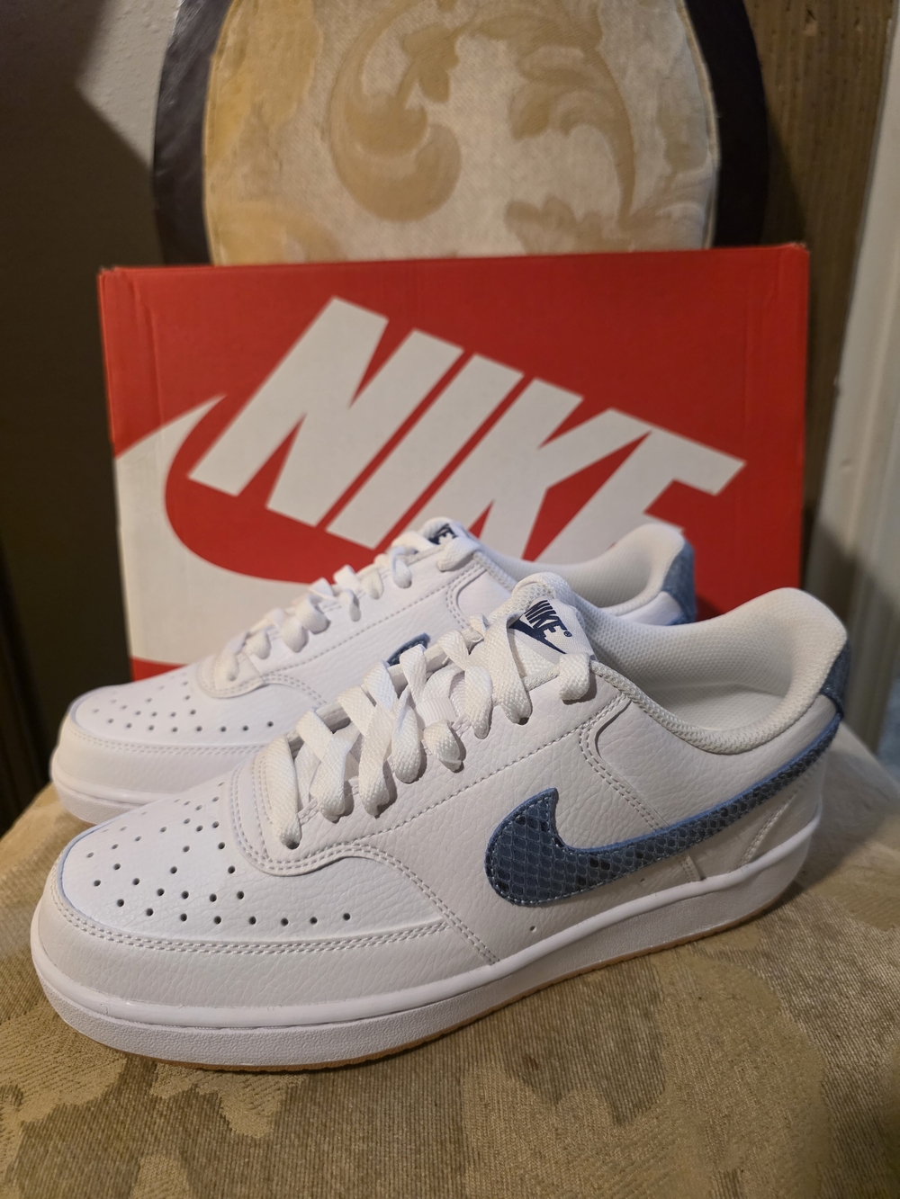 Nike White Low-Top Sneakers with Blue Swoosh